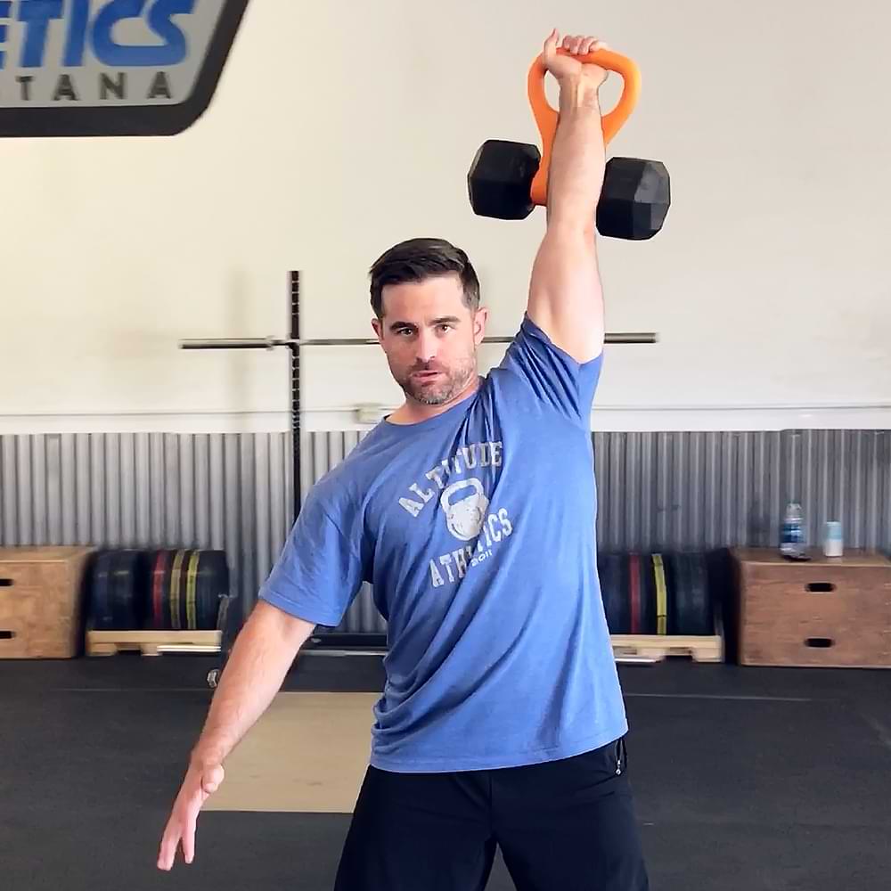 Gym overhead lift with Kettle Gryp